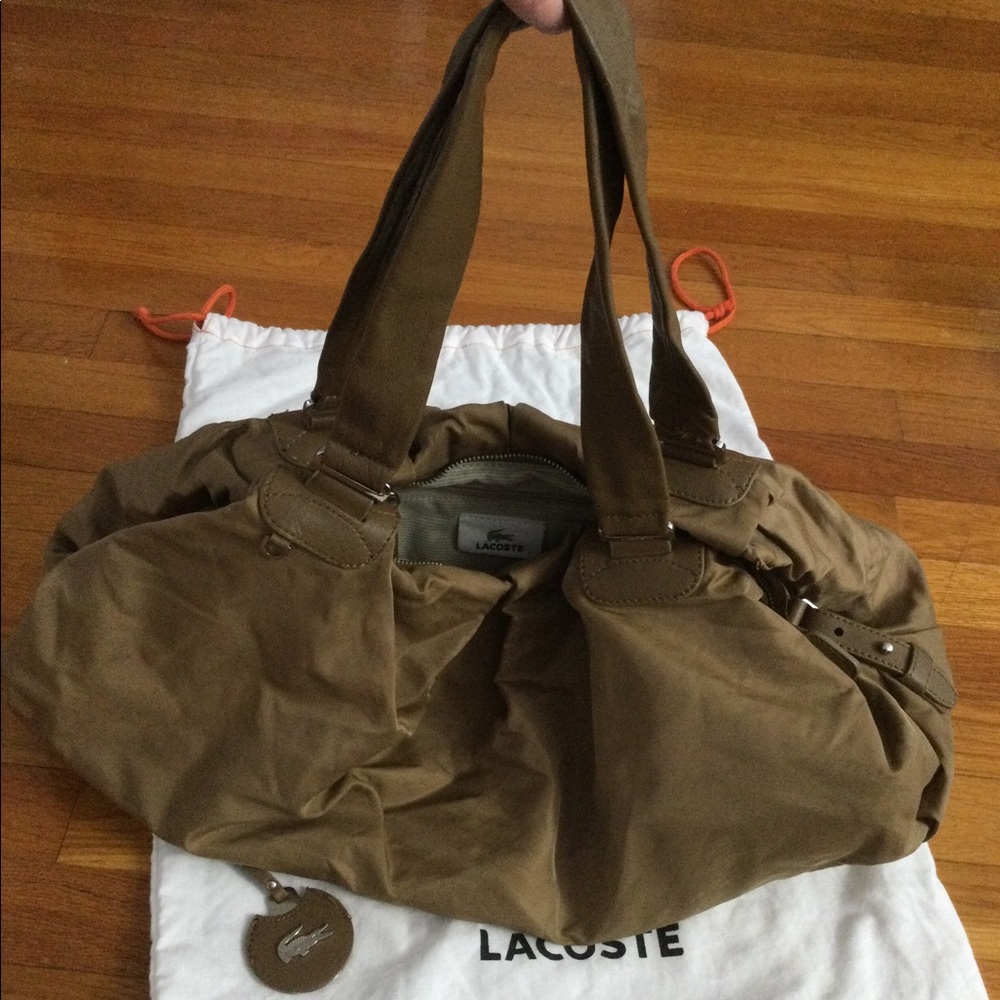 Lacoste tan color duffle shoulder bag